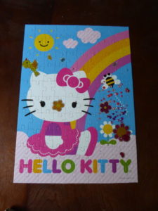 Lindsey's Hello Kitty puzzle on Kitchen Table