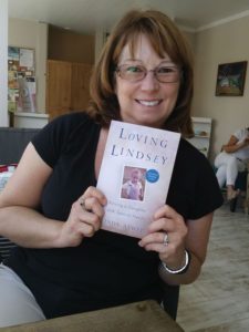 Statesman Journal photo of Linda Atwell holding Loving Lindsey